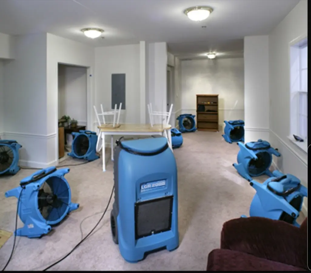Air movers and dehumidifier setup for Water Damage Restoration in Medina